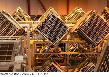 Production Of Cremant Sparkling Wine In Burgundy, France. Automatically Powered Riddling Remuage Box