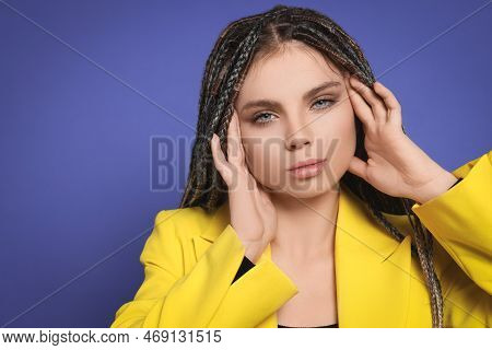 Beautiful Woman With Long African Braids On Purple Background, Space For Text