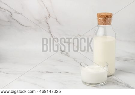 Homemade Yogurt, Kefir, Fermented Milk On A Light Background. Healthy, Clean Eating. Vegan Or Gluten