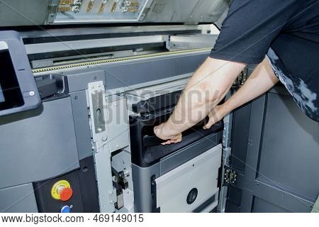 The Worker Moves The Working Camera Of The 3d Printer Into The 3d Printer. Large Industrial 3d Print