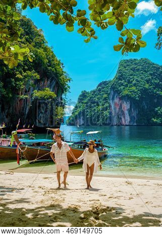 Couple Visit Koh Lao Lading Near Koh Hong Krabi Thailand, Beautiful Beach With Longtail Boats