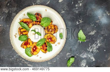 Gourmet Roasted Peaches With Burrata Soft Cheese, Basil And Drizzled With Honey, With Rose Wine. Ant