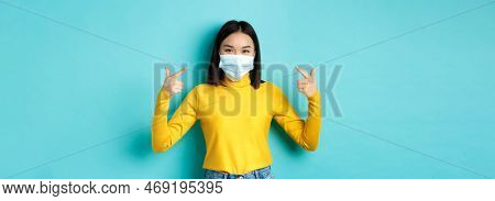 Covid-19, Social Distancing And Pandemic Concept. Young Asian Woman Protect Herself From Coronavirus