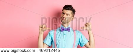 Serious And Funny Young Man Trying Look Cool, Pointing At Himself To Self-promote, Being A Professio