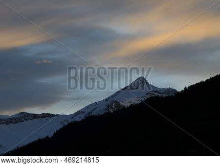Moody Evening Sky Over Mount Oldehore. Swiss Alps.
