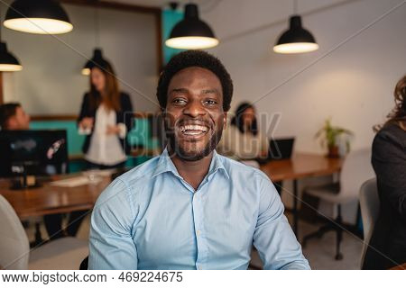 Happy African Man In Coworking Creative Space
