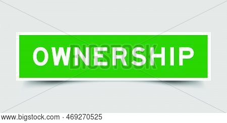 Green Color Square Label Sticker With Word Ownership On Gray Background