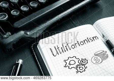 Utilitarianism Is Shown On A Conceptual Photo Using The Text