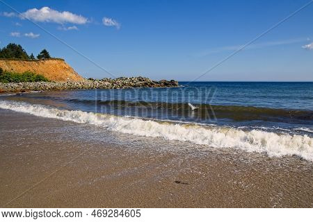 Waves On The Beach At Kennington Cove, Cape Breton, Nova Scotia, Canada.
