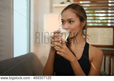 Sporty Woman Drinking Flavored Amino Acid Vitamin Powder After Exercise. Vitamin, Supplement, Nutrit