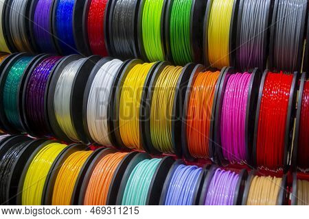 Many Multi-colored Spools Of Thread Of Filament For Printing 3d Printer. Material Coils For Printing