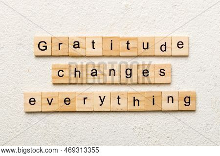 Gratitude Changes Everything Word Written On Wood Block. Gratitude Changes Everything Text On Cement