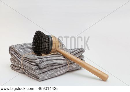 Dish Wash Bamboo Scrub Brush And Gray Towels. Sustainable Lifestyle Zero Waste Concept. Clean Withou