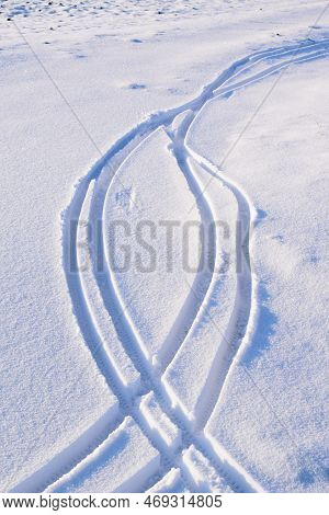 Bike Tire Tracks In The Fresh Deep Snow