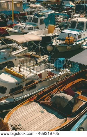 Fishing Boats Moored In Small Marina In Town Of Lovran, Croatia. Selective Focus.