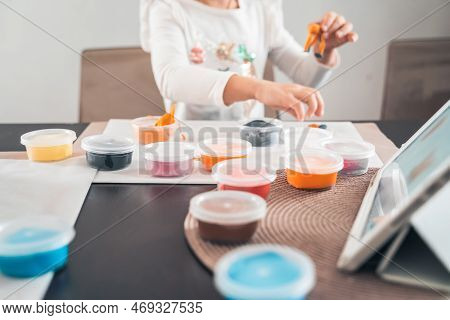 Little Girls Sculpt Figurines Crafts From Air Plasticine, Modeling Dough.online Lessons In Tablet. C