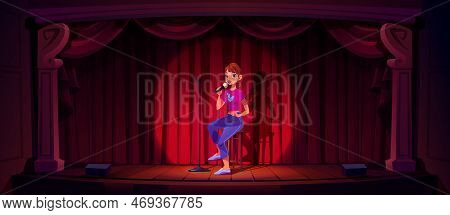 Comedian Girl With Mic On Stage. Standup, Comedy Performance, Open Mike Event With Woman Joking Sitt