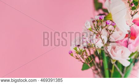 Chamelacium Hookata, Roses And Daffodils In A Bouquet On A Pink Background Close-up, Copy Space