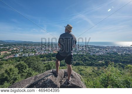 Asian Fat Man Stand On The Rock  At Khao Hin Lek Fai View Point.khao Hin Lek Fai Is A Place To See A