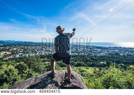 Asian Fat Man Stand On The Rock And Take Photo At Khao Hin Lek Fai View Point.khao Hin Lek Fai Is A 
