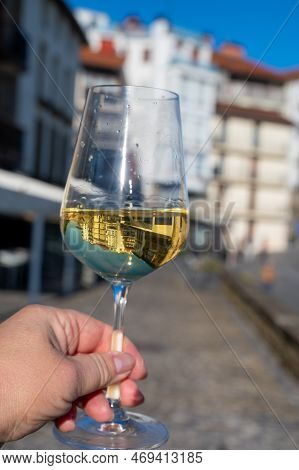 Tasting Of Txakoli Or Chacolí Slightly Sparkling Very Dry White Wine Produced In Spanish Basque Coun
