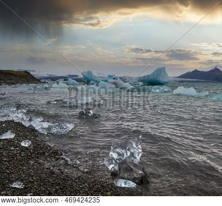 Jokulsarlon Glacial Lake, Lagoon With Ice Blocks, Iceland. Situated Near The Edge Of The Atlantic Oc