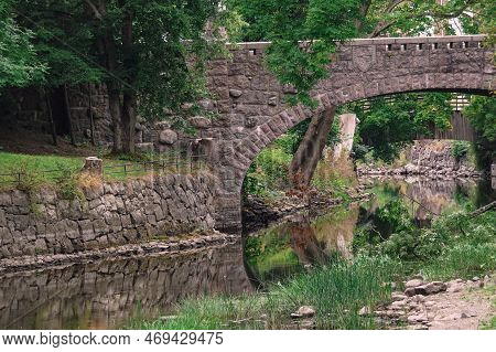 View Of Old Stone Bridge Over River