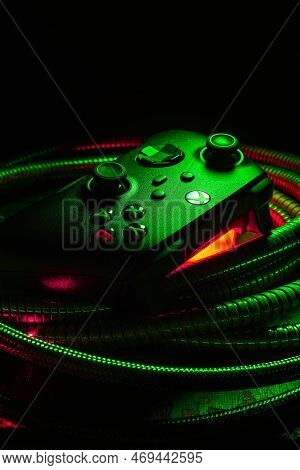 January 15, 2023, Odessa, Ukraine. A Black Xbox Wireless Controller Highlighted In Green And Red. Co