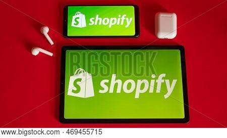 Tokio, Japan - June 05, 2022: Shopify Web Page Displayed On A Modern Laptop, Smartphone And Notebook