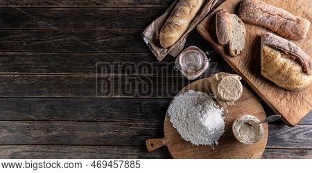 Bakery Concept, Flour Bread And Glasses With Rye Sourdough On The Table. - Top Of View