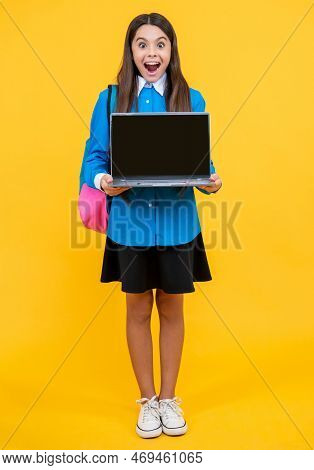Amazed School Girl Presenting Estudy Education. Photo Of School Girl Presenting Estudy Education.