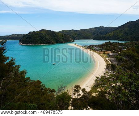 Elevated View Of Tropical Pacific Ocean Beach Surrounded By Lush Green Nature In Abel Tasman Nationa