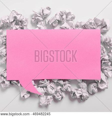 Important Messages On One Sticky Pink Note On Desk With Paper Wraps. Crutial Informations On Memos O