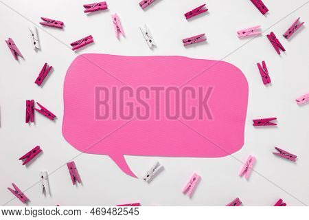Important Messages. Sticker Lying On White Desk With Clotherspins. Crutial Informations Memos. White