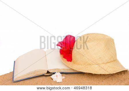 Straw hat ans bog om sand