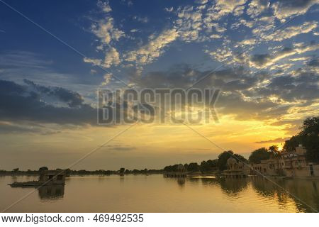 Spectacular Sunset At Gadisar Lake,jaisalmer,rajasthan, India. Setting Sun And Colorful Clouds In Th