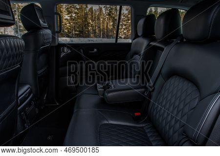 Modern Car Inside. Leather Passenger Seats With Opened Armrest. Comfortable Leather Seats. Central A