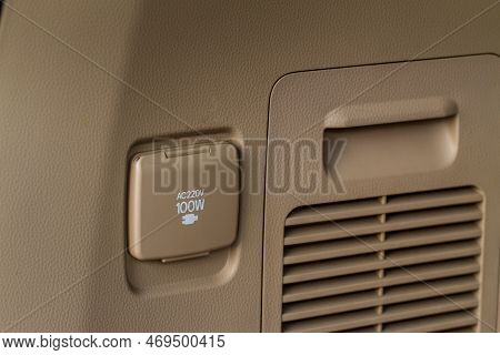220v Power Outlet Socket In The Car. Closed Sockets.