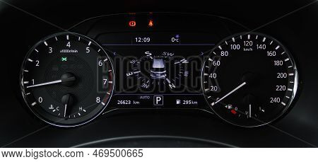 Сompass On The Digital Dashboard Of Modern Car. Modern Digital Car Mileage. Gps Navigation.