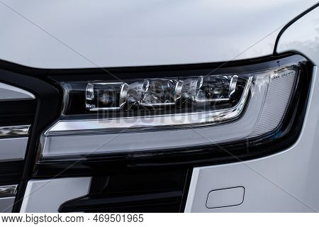 Moscow, Russia - December 11, 2021 Toyota Land Cruiser 300 (j300) Modern Car Headlight Close Up View