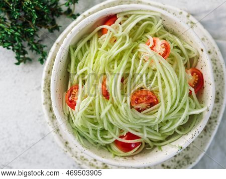 Zucchini Noodles Salad. Vegetable Noodles - Green Zoodles Or Courgette Spaghetti With Cherry Tomatoe