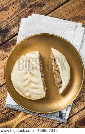 Wang Mandu Pyanse Steamed Pie Stuffed With Vegetable And Meat Wooden Background. Top View