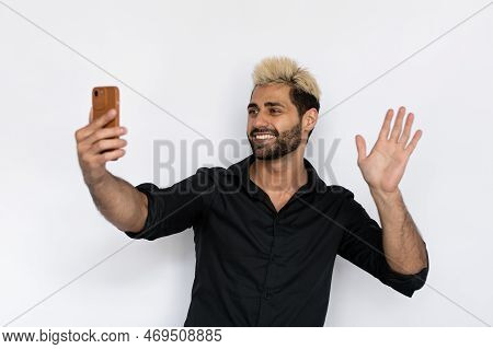 Portrait Of Joyful Young Man Taking Selfie. Male Caucasian Model With Brown Eyes, Ombre Painted Hair