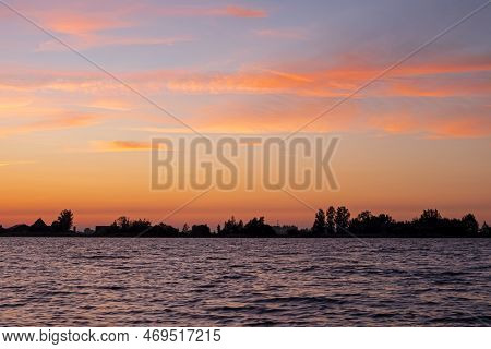 Sunset At The Sneekermeer In Friesland The Netherlands