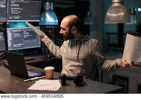 Frustrated Software Developer Working Late At Night, Feeling Under Pressure To Meet Deadline. Using 