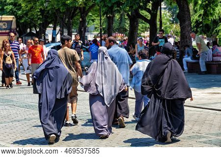 Istanbul, Turkey - July 05, 2018: Unknown Women In Hijab Clothes On One Of The Central Streets Of Is