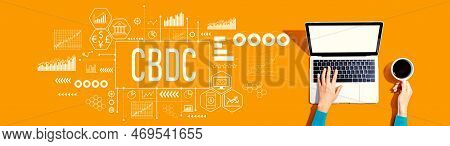 Cbdc - Central Bank Digital Currency Concept With Person Using A Laptop Computer