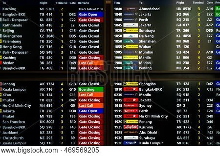 Changi Airport, Singapore - January 24, 2020: Real Photo Of Departures Board Fragment In Singapore A