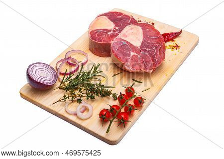 Raw Meat, Veal Ossobuco, Beef On The Bone, On A Wooden Cutting Board, On A White Isolated Background