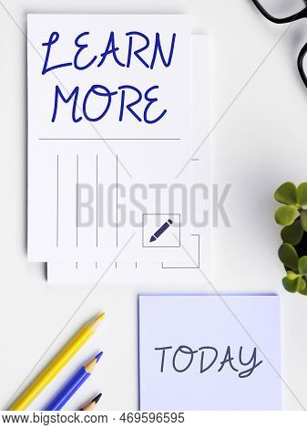 Hand Writing Sign Learn More. Business Idea Deepen Knowledge Of The Thing You Want To Do Or New Skil